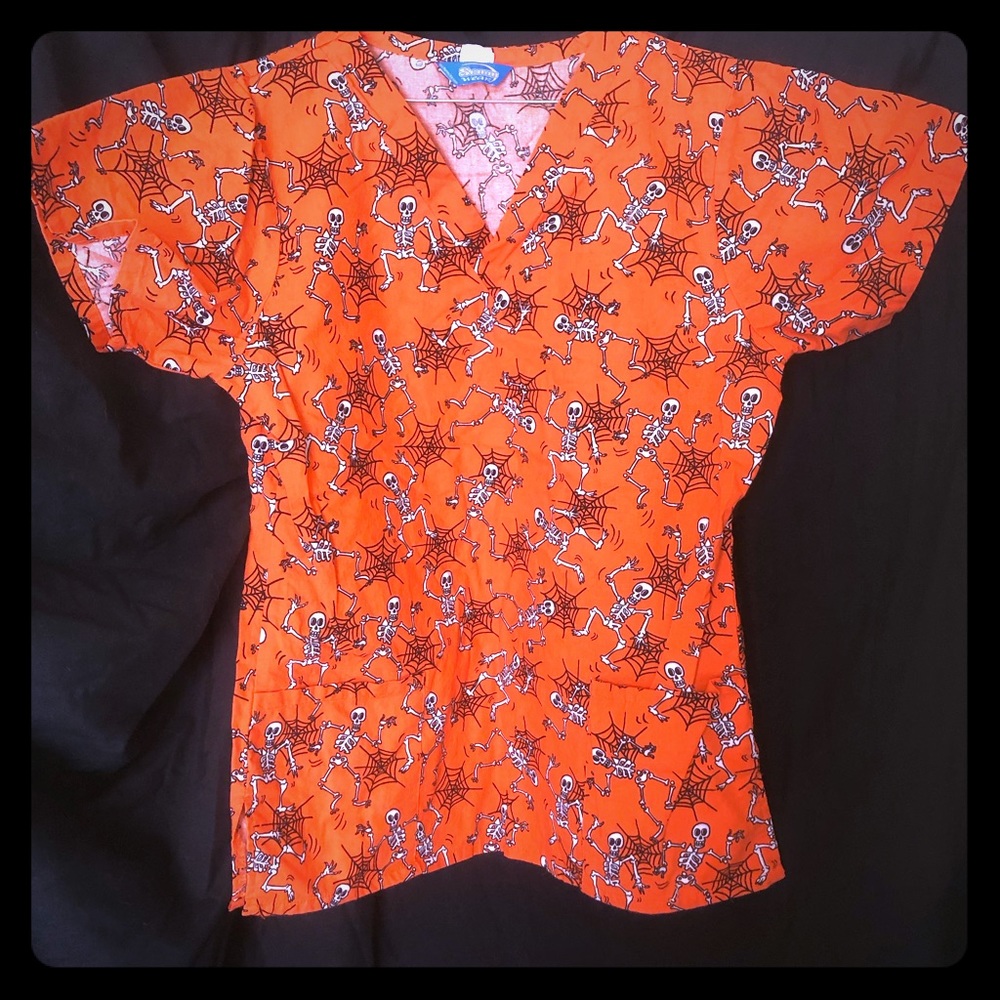 Orange skeleton scrub top